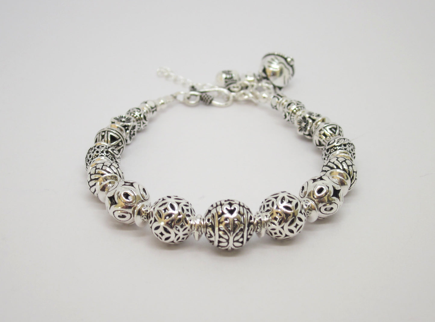 Sterling Silver Beaded Charm Bracelets, inspired by ancient Feng Shui principles, designed to attract wealth, prosperity, and good fortune