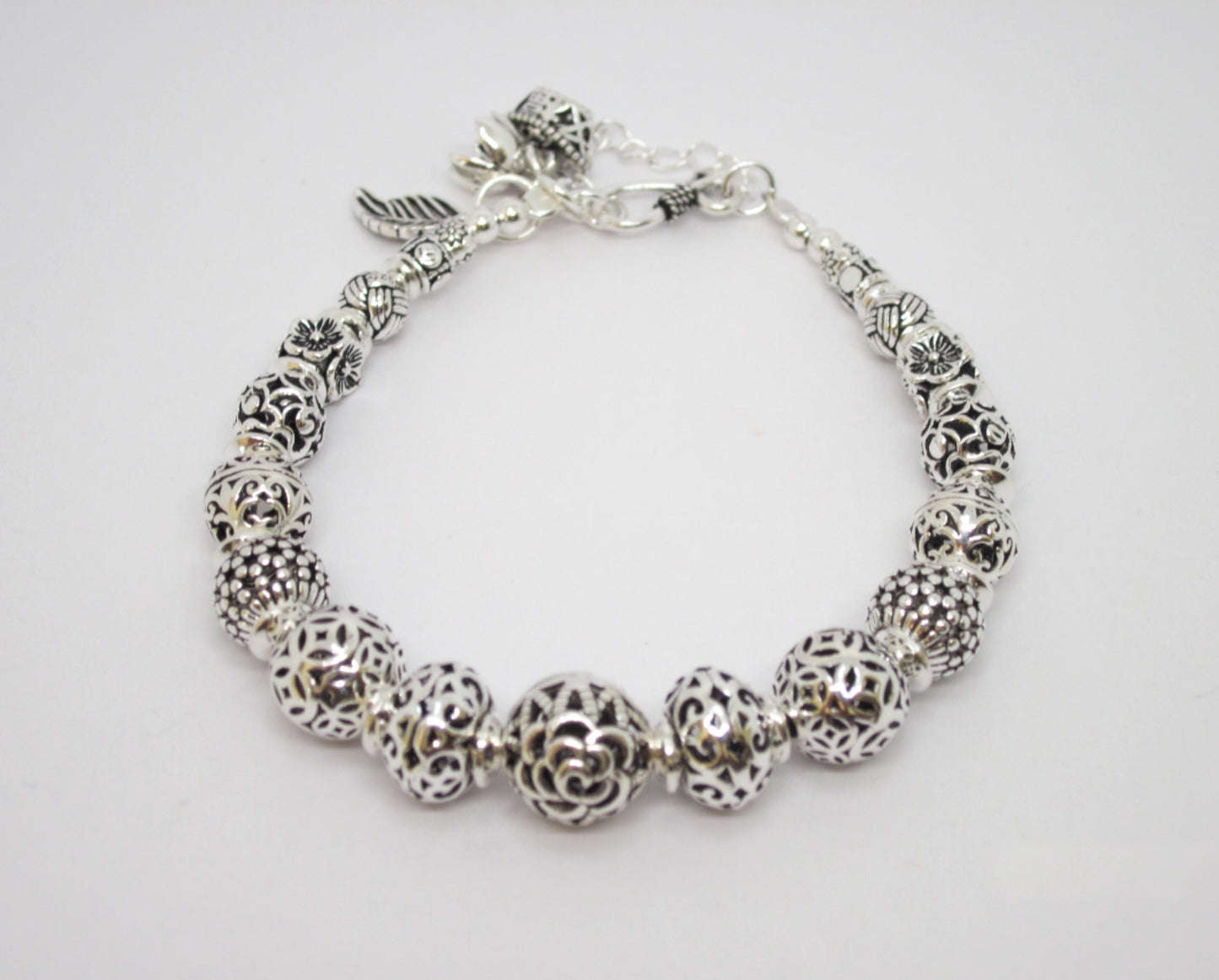 Sterling Silver Beaded Charm Bracelets, inspired by ancient Feng Shui principles, designed to attract wealth, prosperity, and good fortune