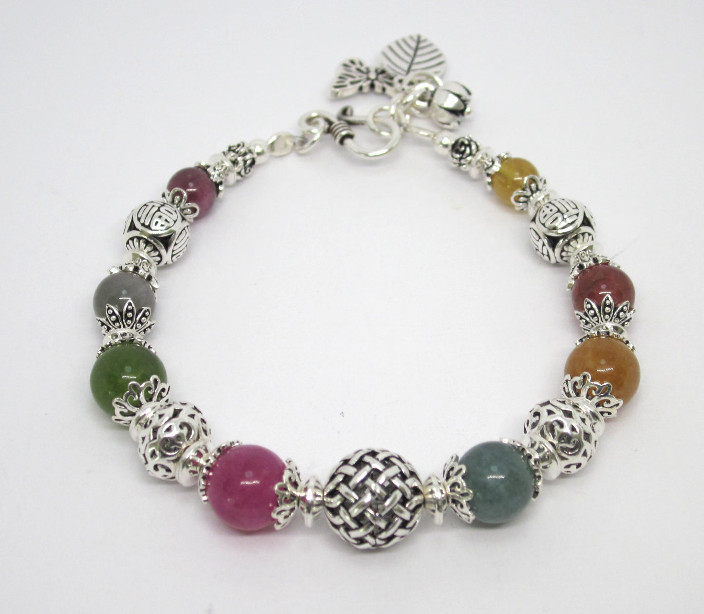 Handmade Multi-Tourmaline Sterling Silver Bracelet: Adjustable Length, Unique Charms