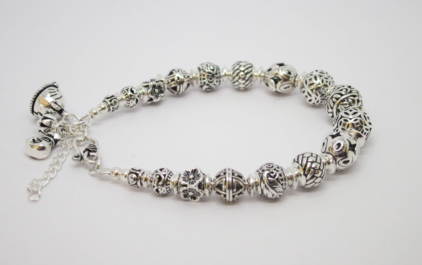 Sterling Silver Beaded Charm Bracelets, inspired by ancient Feng Shui principles, designed to attract wealth, prosperity, and good fortune