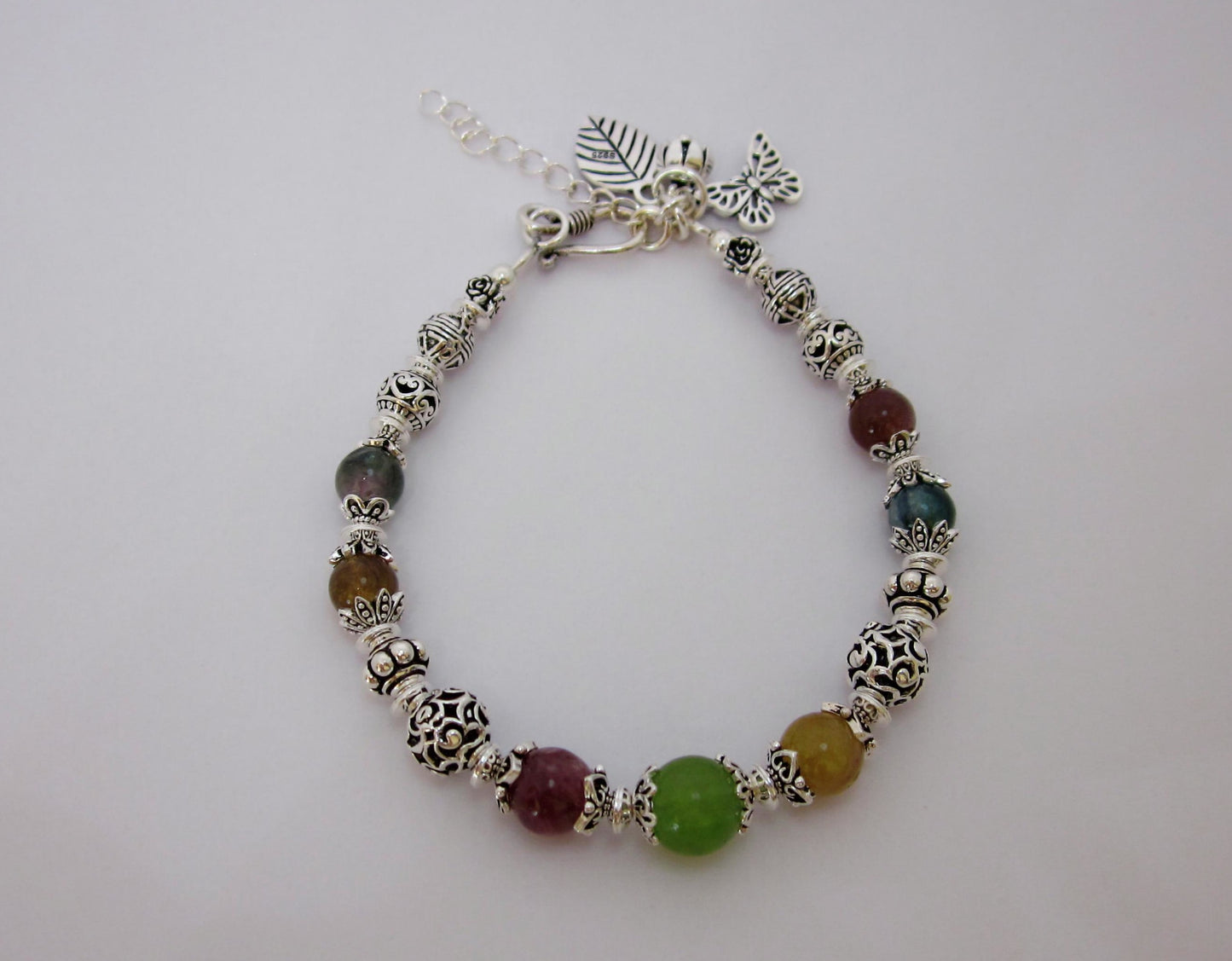 Handmade Multi-Tourmaline Sterling Silver Bracelet: Adjustable Length, Unique Charms