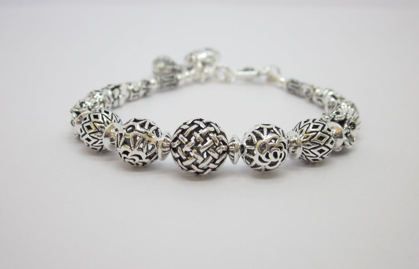 Sterling Silver Beaded Charm Bracelets, inspired by ancient Feng Shui principles, designed to attract wealth, prosperity, and good fortune