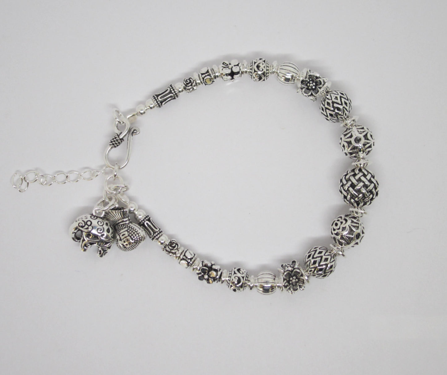 Sterling Silver Beaded Charm Bracelets, inspired by ancient Feng Shui principles, designed to attract wealth, prosperity, and good fortune