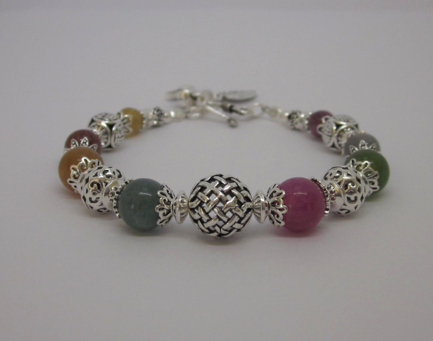 Handmade Multi-Tourmaline Sterling Silver Bracelet: Adjustable Length, Unique Charms